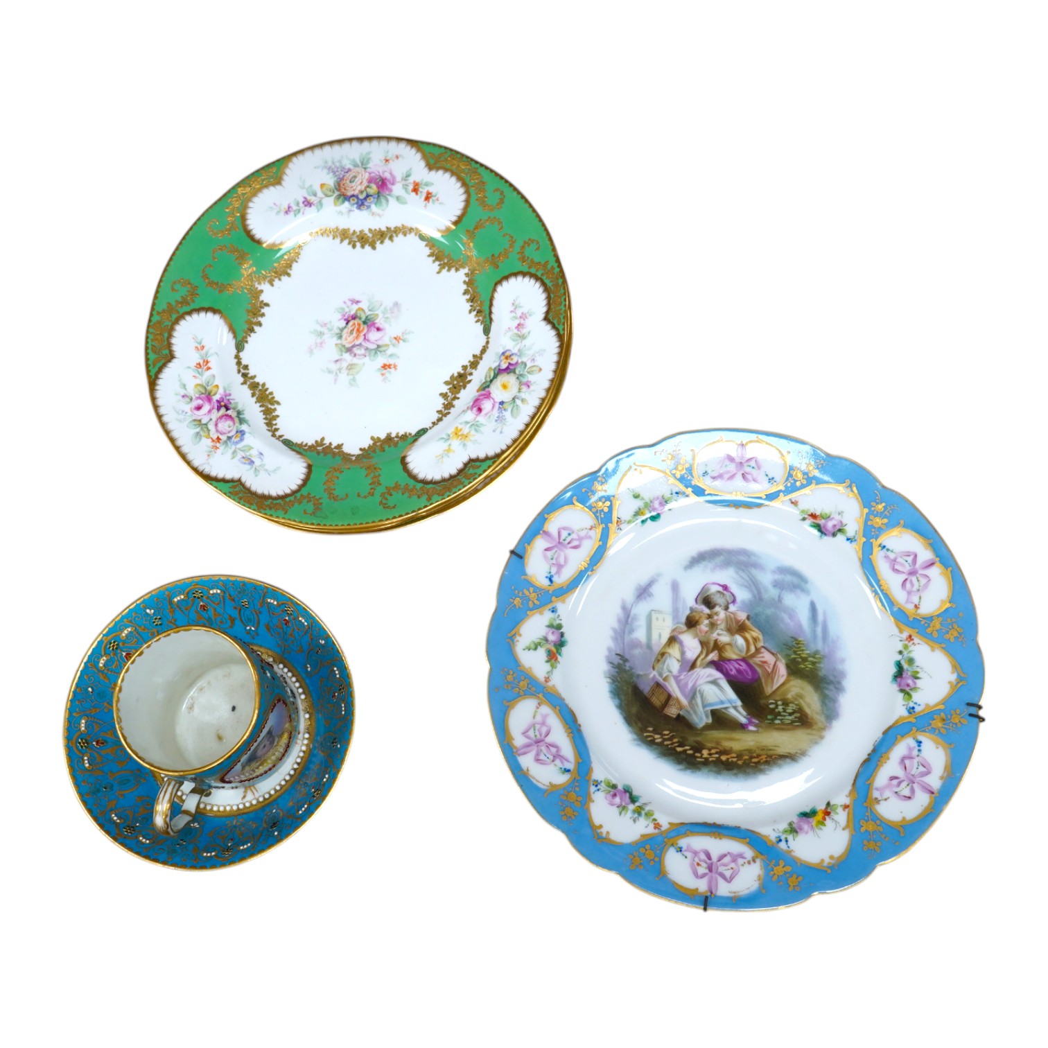 Three Sevres style plates, a Sevres coffee can and saucer and a similar plate, coffee can 7cm high. Condition - good